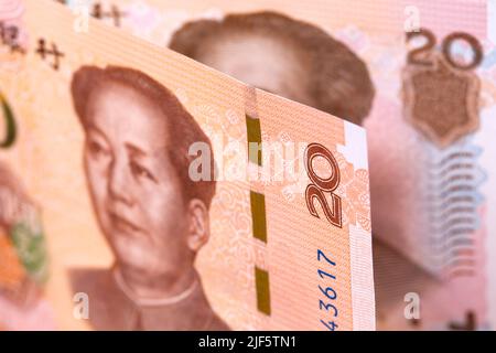 Chinese money - 20 Yuan - business background - Renminbi Stock Photo