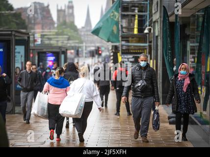 File photo dated 29/06/20 of shoppers along Edinburgh's Princes Street. Recovery from the pandemic by Scottish businesses is starting to falter, economic experts have warned. Strathclyde University's Fraser of Allander Institute made the statement on Thursday as it scaled down its forecast for economic growth in 2023, with the cost-of-living crisis taking a toll on both companies and consumers. Issue date: Thursday June 30, 2022. Stock Photo