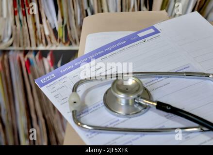 File photo dated 10/09/14 of a registration form and a stethoscope, as health experts have sounded the alarm over a 'growing shortage' of family doctors after new estimates suggested a quarter of posts could be vacant in the next 10 years. Issue date: Thursday June 30, 2022. Stock Photo