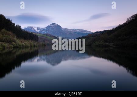 Ibiur reservoir with Txindoki mountain as background, Basque Country in Spain Stock Photo
