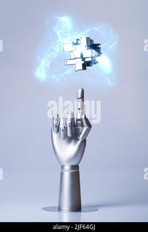 Mechanical robot arm or hand interacts with futuristic digital technologies. Concept of virtual, augmented reality, robots and artificial intelligence Stock Photo