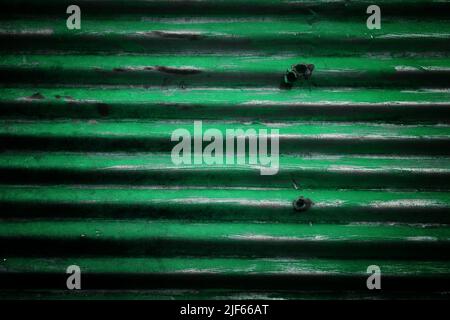 Dark green distressed metal texture. Black grungy metal background. Stock Photo