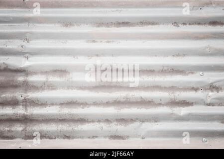 White galvanized sheet metal texture. Corrugated steel copyspace background. Stock Photo