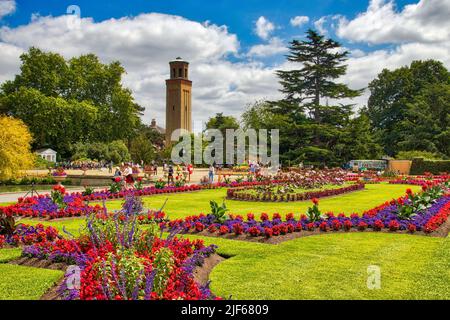 KEW, UK - JULY 15, 2019: People visit Kew Gardens in Greater London. Royal Botanic Gardens are designated as UNESCO World Heritage Site. Stock Photo