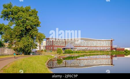 Minsk, Belarus - June 30, 2022: Marriott Hotel. View from the embankment of the Svisloch river Stock Photo