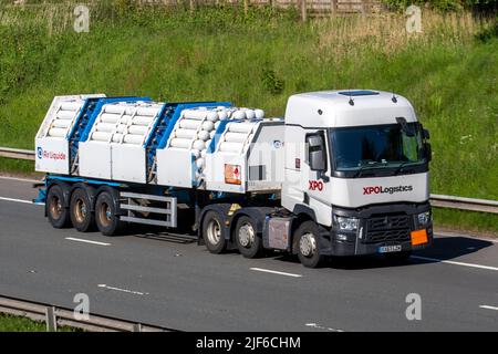 XPO Logistics, 2017 white RENAULT 480.26 6x2 TML 12777cc trucks. BOC, Linde Group Industrial Gases being transported on the M6 near Manchester, UK Stock Photo