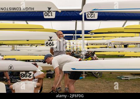Henley, Oxfordshire, England, UK 29 June 2022 Day at Henley Royal Regatta. Rowing teams prepare their boats, engage in team talks and launch