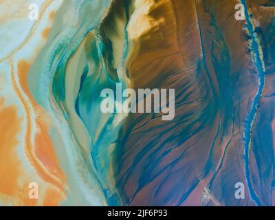 Top view of abstract textured background with colorful stains creating creative patterns Stock Photo