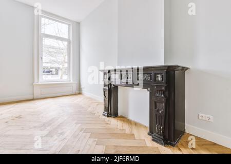 Unfurnished modern room with shelf located in light living room Stock Photo