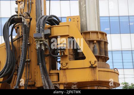 Industrial drilling rig machinery on metro construction site. Spring and drill part of Drilling vehicle for drilling holes Stock Photo