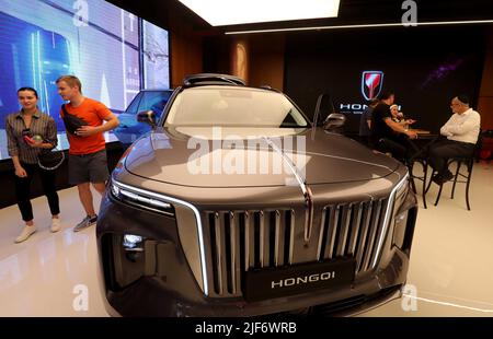 Tel Aviv, Israel. 28th June, 2022. The Hongqi E-HS9 model, a pure-electric luxury SUV, is showcased at the first showroom for China's limousine brand Hongqi in Tel Aviv, Israel, June 28, 2022. Israeli car dealership Samelet Group on Tuesday opened the first showroom for China's limousine brand Hongqi in the central Israeli city of Tel Aviv. Hongqi, meaning 'red flag' in the Chinese language, has grown to be China's iconic marque since its establishment in 1958 through years of limo services for national ceremonial events. Credit: Gil Cohen Magen/Xinhua/Alamy Live News Stock Photo