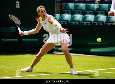 Wimbledon, UK, June 28, 2022, Andrea Petkovic of Germany in action against Yanina Wickmayer of Belgium during the first round of the 2022 Wimbledon Championships, Grand Slam tennis tournament on June 28, 2022 at All England Lawn Tennis Club in Wimbledon near London, England - Photo: Rob Prange/DPPI/LiveMedia Stock Photo