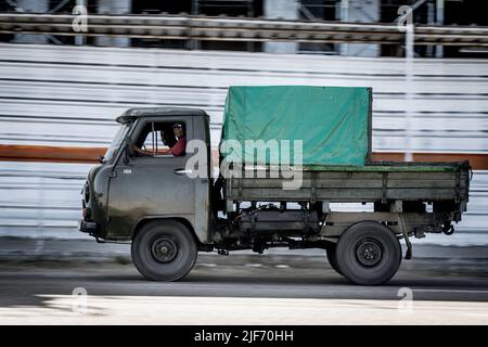 Classic offroad van in the old city. Uaz 452 Stock Photo