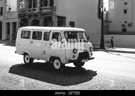 Classic offroad van in the old city. Uaz 452 Stock Photo