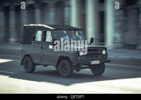 Vintage offroad car in the old city. Uaz 496 Stock Photo