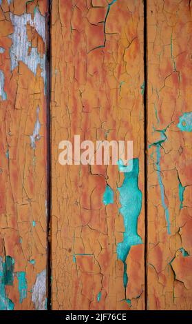 Vertically wooden old board with blue paint spots. Vintage wooden background. Stock Photo