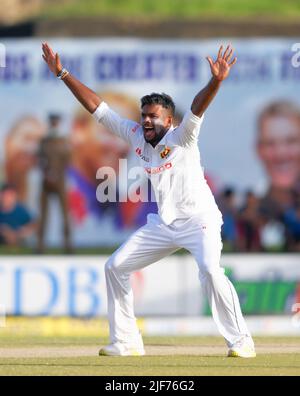 Galle, Sri Lanka. 30th June 2022. Sri Lanka's Ramesh Mendis celebrates after taking the wicket of Australia's Cameron Green  during the 2nd day of the 1st test cricket match between Sri Lanka vs Australia at the Galle International Cricket Stadium in Galle on 30th June, 2022. Viraj Kothalwala/Alamy Live News Stock Photo