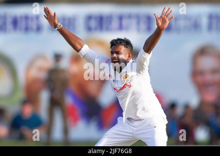 Galle, Sri Lanka. 30th June 2022. Sri Lanka's Ramesh Mendis celebrates after taking the wicket of Australia's Cameron Green  during the 2nd day of the 1st test cricket match between Sri Lanka vs Australia at the Galle International Cricket Stadium in Galle on 30th June, 2022. Viraj Kothalwala/Alamy Live News Stock Photo
