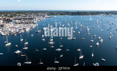 Aerial stock photos of the Newport Harbor, boats docked and moored in late afternoon sun at the Newport International Boat Show, Safe Harbor Shipyard. Stock Photo