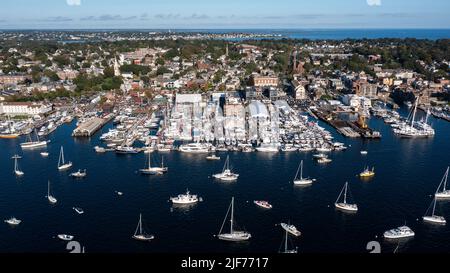 Aerial stock photos of the Newport Harbor, boats docked and moored in late afternoon sun at the Newport International Boat Show, Safe Harbor Shipyard. Stock Photo