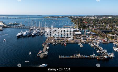 Aerial stock photos of the Newport Harbor, boats docked and moored in late afternoon sun at the Newport International Boat Show, Safe Harbor Shipyard. Stock Photo