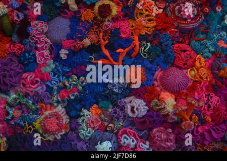 Crocheted patterns in forms of Corals in various colours Stock Photo