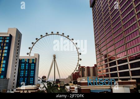 The Las Vegas Ferris wheel surrounded by shops and hotels, Las Vegas Strip, Las Vegas Nevada Stock Photo