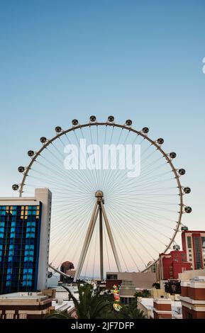 The Las Vegas Ferris wheel surrounded by shops and hotels, Las Vegas Strip, Las Vegas Nevada Stock Photo