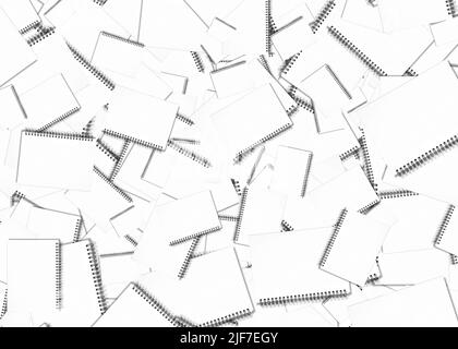 Abstract business background: pile of spiral notebooks on the table Stock Photo