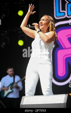 Leeds, UK. 25th June, 2022. Rozalla Performs in her hit song 'Everybody's Free' at Lets Rock Leeds 80s Festival. Credit: SOPA Images Limited/Alamy Live News Stock Photo