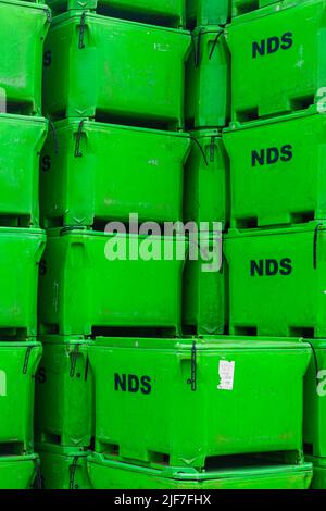 Large stack of empty fresh fish containers ready for use on a Steveston dock in British Columbia Canada Stock Photo