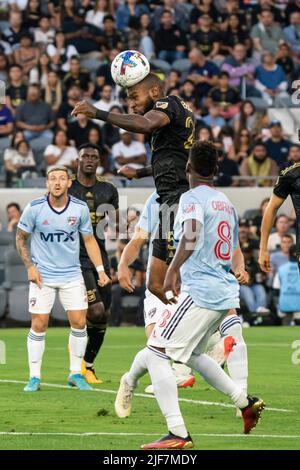 LAFC defender Sebastien Ibeagha (25) heads the ball during a MLS match against the FC Dallas, Wednesday, June 29, 2022, at the Banc of California Stad Stock Photo