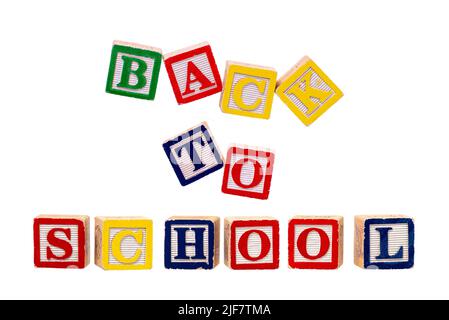 alphabet in wooden blocks, back to school isolated on a white background. Stock Photo