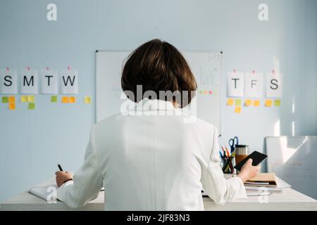 Time Management, Planning weekly schedule For Business Owners managers. Young Businesswoman, manager Stock Photo