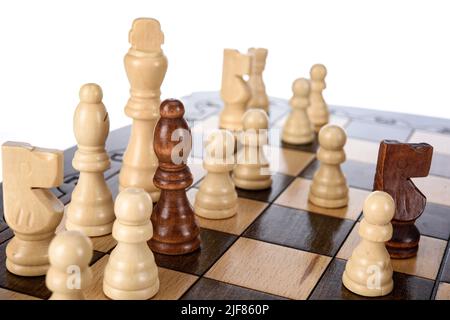 Beige Brown Wooden chess different pieces figures standing on chessboard. Closeup game concept competition, Classic Tournament. Stock Photo