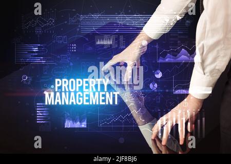 Businessman touching huge screen concept Stock Photo