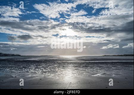 Sunset over Instow beach looking towards Northam in North Devon in late June Stock Photo