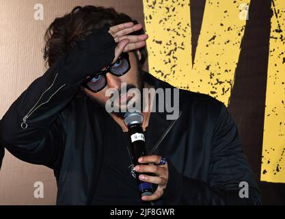 Mumbai, India. 30th June, 2022. Bollywood actor Arjun Kapoor interacts with the media during the trailer launch of his upcoming film 'Ek Villain Returns' in Mumbai. The film will be released in India on 29th July 2022. (Photo by Ashish Vaishnav/SOPA Images/Sipa USA) Credit: Sipa USA/Alamy Live News Stock Photo