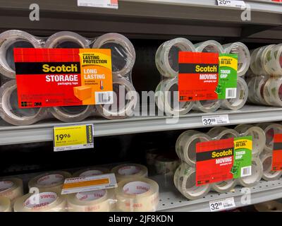 Mill Creek, WA USA - circa June 2022: Angled view of packing tape for sale inside a Staples store. Stock Photo