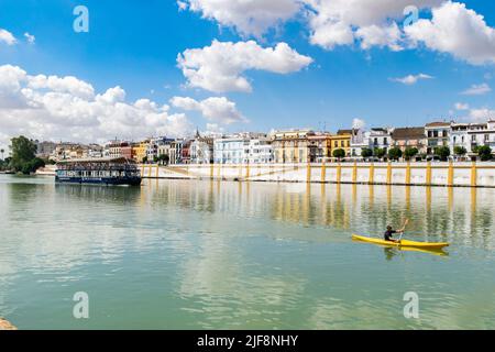 People practicing kayak at rio Guadalquivir, Sevilla Stock Photo