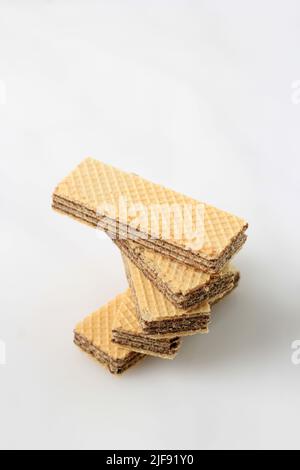 Stacked Chocolate Wafer on White Background, Copy Space for Text Stock Photo