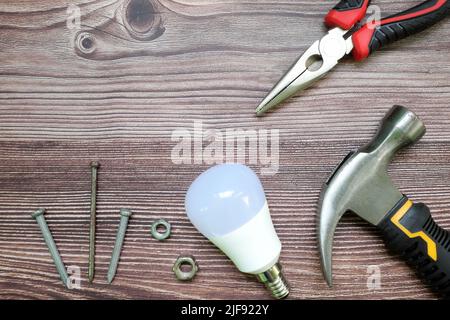 Home improvement, repair and DIY flat lay with copy space on wooden backdrop. Stock Photo
