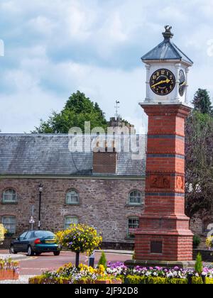 The 1887 Jubilee Clock, by Cheah Chen Eok, is a free standing, square column, Victorian clock tower in Twyn Square, Usk, Monmouthshire, Wales, UK. Stock Photo