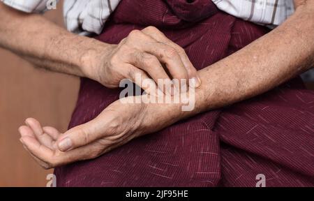 Self-examination of pulsation. Counting pulse rate in home. Stock Photo