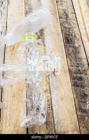 Plastic water bottles for recycle on the wooden table background Stock Photo