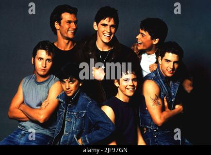 TOM CRUISE, MATT DILLON, EMILIO ESTEVEZ, PATRICK SWAYZE, ROB LOWE, C. THOMAS HOWELL and RALPH MACCHIO in THE OUTSIDERS (1983), directed by FRANCIS FORD COPPOLA. Credit: WARNER BROTHERS / Album Stock Photo