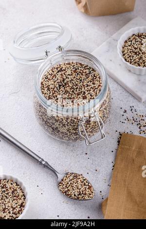 Red, white and brown quinoa. Stock Photo