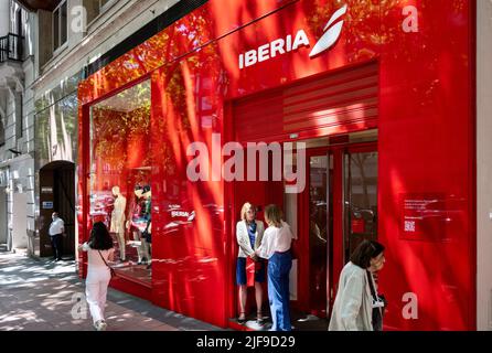 Madrid, Spain. 25th May, 2022. Pedestrians walk past the Spanish airline store Iberia in Spain. (Photo by Xavi Lopez/SOPA Images/Sipa USA) Credit: Sipa USA/Alamy Live News Stock Photo
