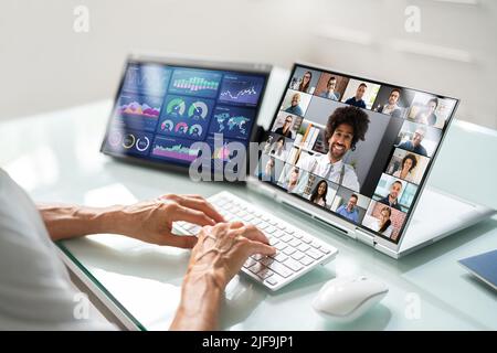 Watching Video Conference Business Webinar On Computer Stock Photo
