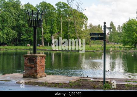 Boultham Park, Lincoln, Originally the park for the Boultham Hall, opened as a public park for the people of Lincoln, Park beacon, Beacon beside lake. Stock Photo